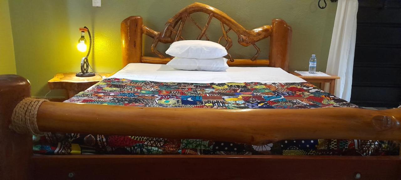 Aivilo Home เอนเทบเบ้ ภายนอก รูปภาพ