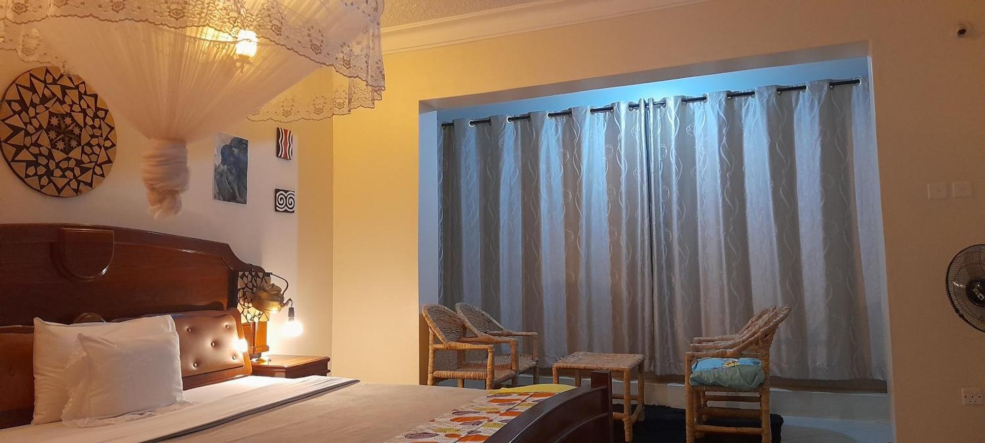 Aivilo Home เอนเทบเบ้ ภายนอก รูปภาพ