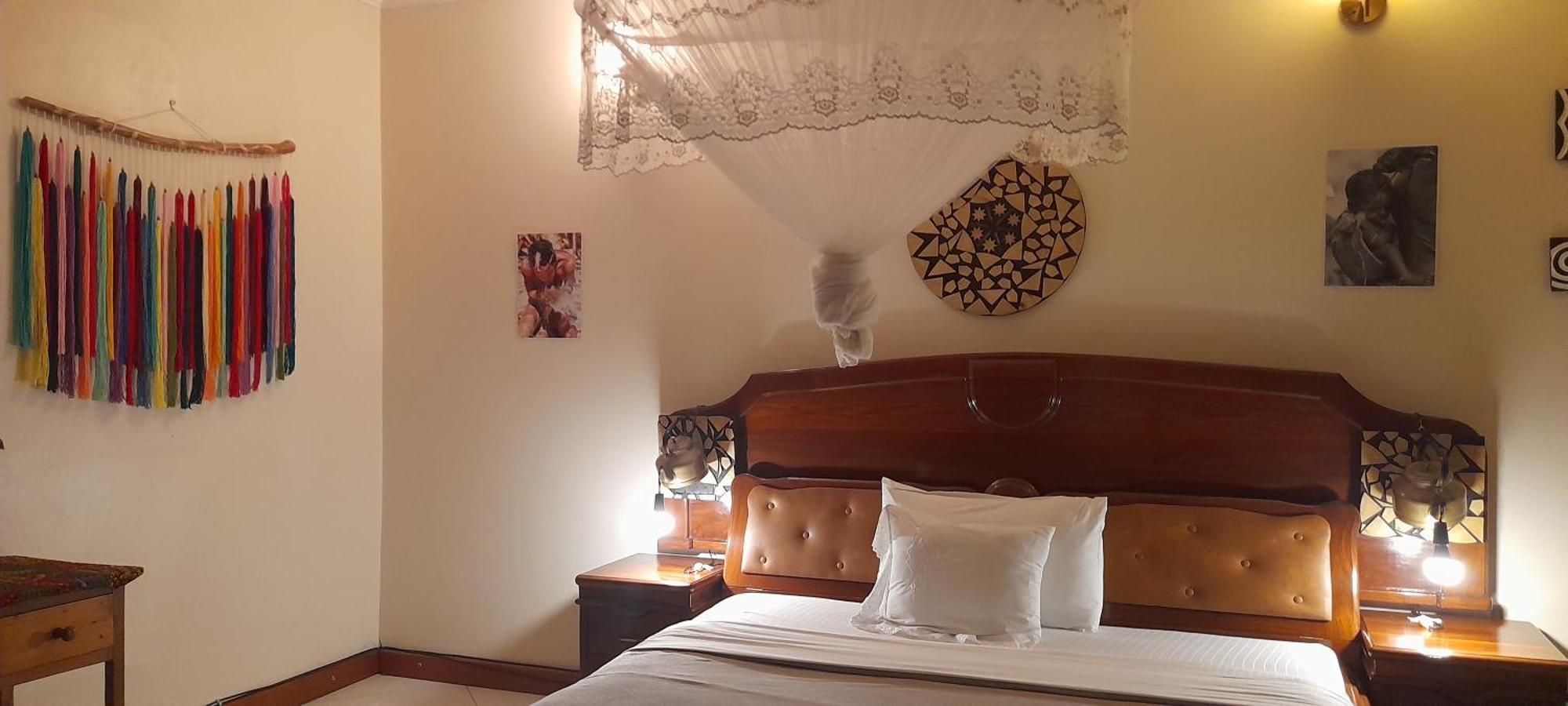 Aivilo Home เอนเทบเบ้ ภายนอก รูปภาพ